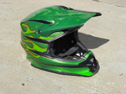 Green dirtbike helmet with stars and old school flames